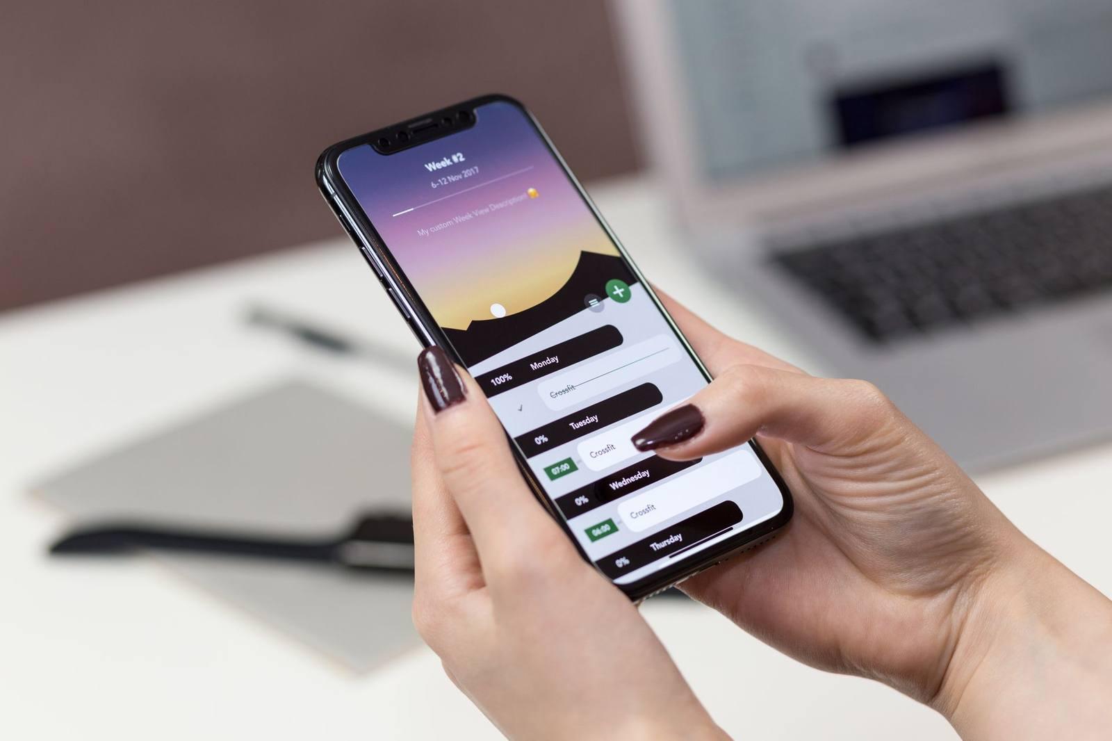 A person adjusting app settings on a smartphone