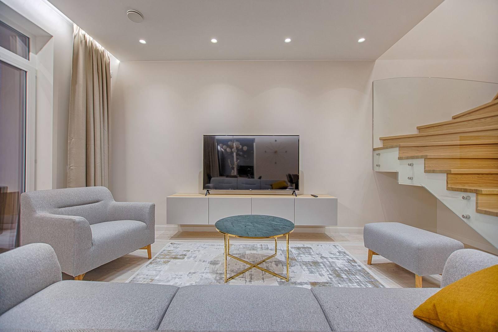 Modern living room with neutral, minimalist decor